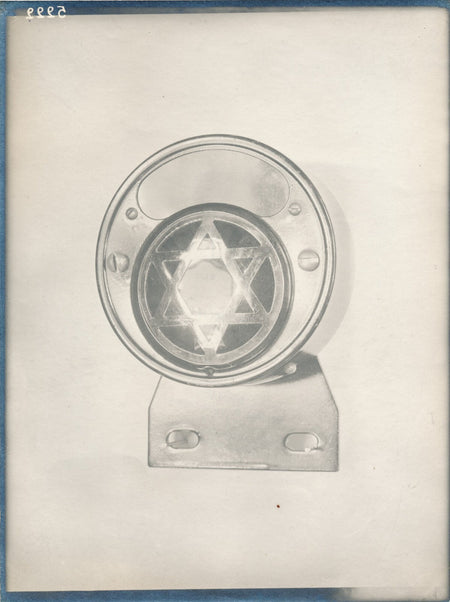 Objet non identifié étoile à six branches photo photographie publicité v. 1930