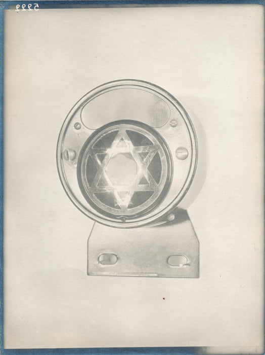 Objet non identifié étoile à six branches photo photographie publicité v. 1930